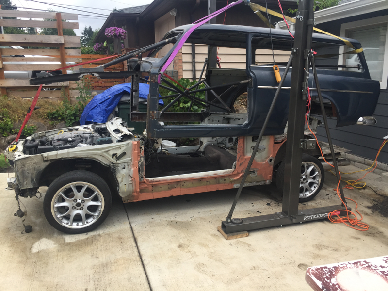 Illustration for article titled True Hero Swapped A Volvo Amazon Wagon Body Onto A BMW E30 In His Driveway
